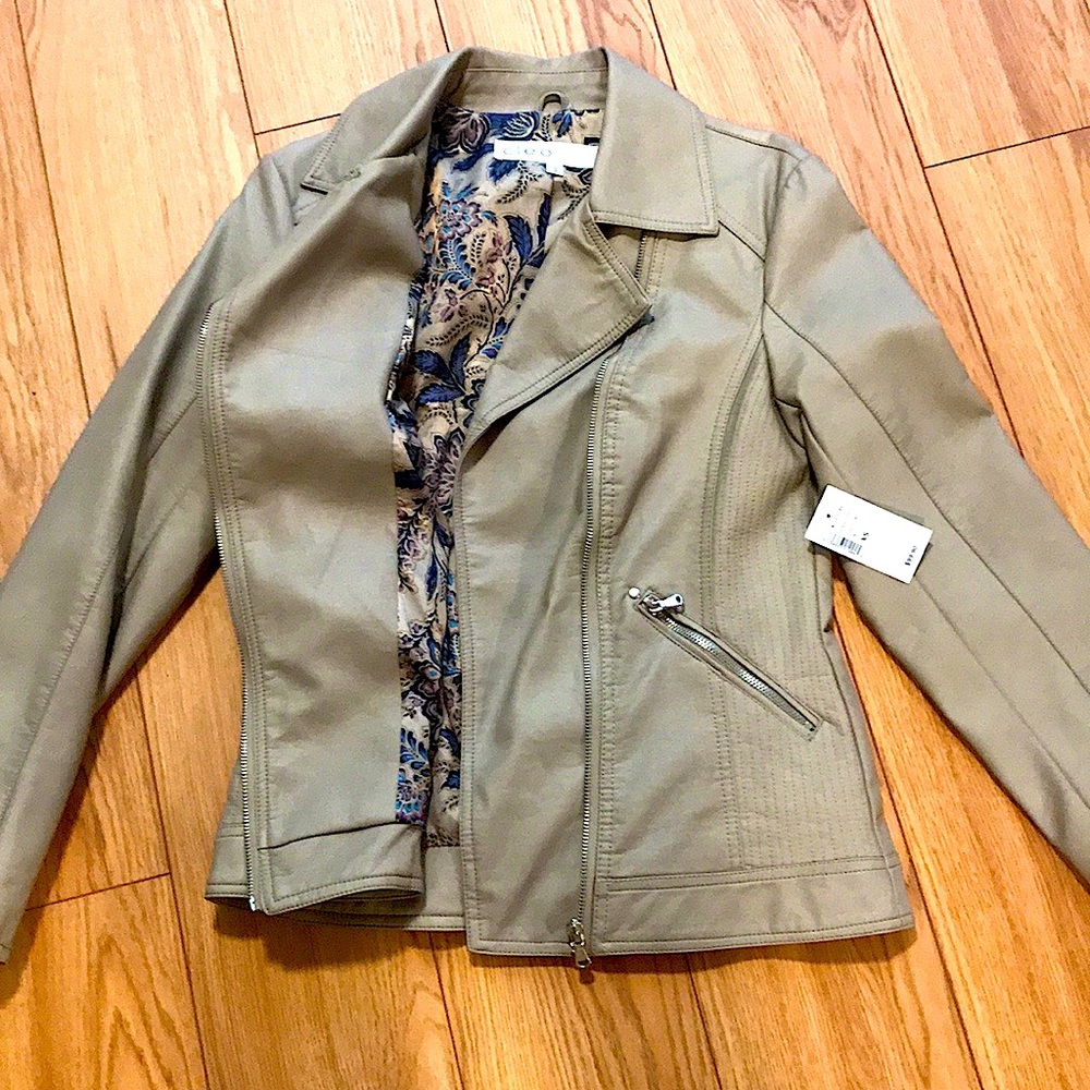 Ladies faux leather motto jacket with beautiful lining detail.